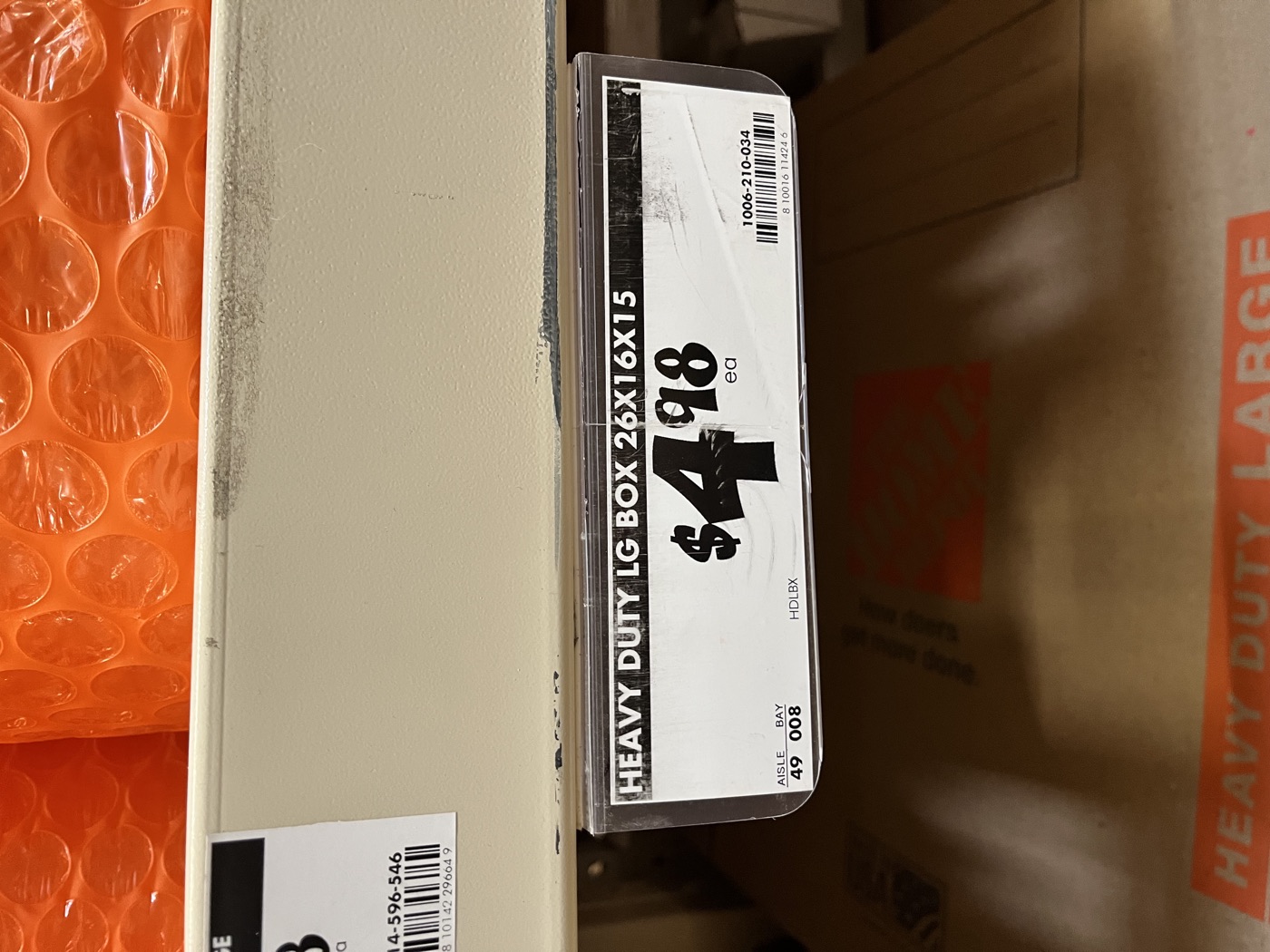 Hardware store price tag on an extra-large moving box — these add up fast on a 3-bedroom move